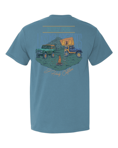 Embrace the magic of summer camping with the "Lasting Adventures" t-shirt! This classic-fit tee features a charming illustration of a peaceful campsite bathed in the warm glow of a summer sunset. It's a powerful reminder of the unforgettable memories created under the open sky with friends and family.