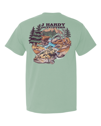 Cast a line into tranquility with the evocative "Trout Stream" t-shirt! This classic-fit tee features a stunning illustration of a majestic trout gracefully swimming down a crystal-clear stream. It's a visual invitation to escape the ordinary and immerse yourself in the beauty of nature.