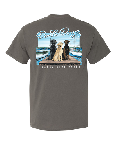 Celebrate the carefree spirit of summer with the "Dock Days" t-shirt! This classic-fit tee features a heartwarming illustration of a group of Labrador Retrievers playfully gathered on a pier. It's a perfect way to showcase your love for these happy-go-lucky dogs and capture the essence of lazy summer days spent by the water.